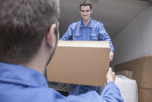 Boxes and furniture stored safely in a self storage unit in Merton