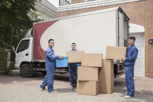 Boxes and furniture prepared for temporary storage in Merton
