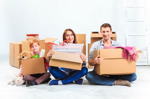 Local removals team planning a move in Merton with boxes and furniture