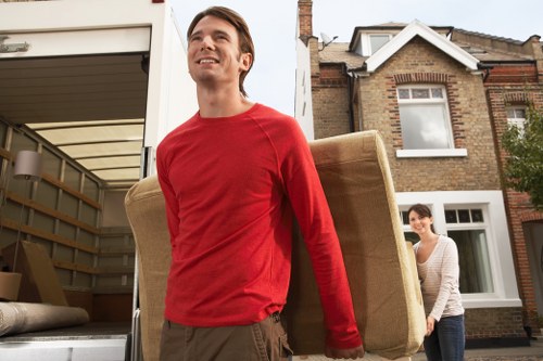 Local student moving day with boxes in a Merton residential area